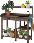 Outsunny Potting Bench Table, Outdoor Garden Table Wooden Work Station with Removable Sink, Faucet, Drawer, Shelves, Hooks, Dark Brown