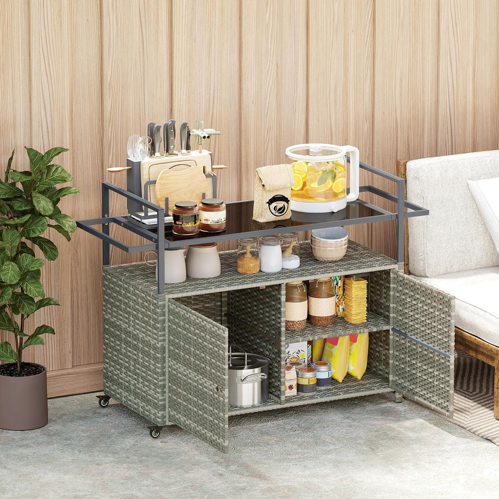 Outsunny PE Rattan Outdoor Storage Cabinet, Wicker Outdoor Bar Table Kitchen Island with Wheels & 2-Tier Shelf, Patio Serving Cart with Glass Top, Handles, Towel Racks for Poolside, Mixed Gray